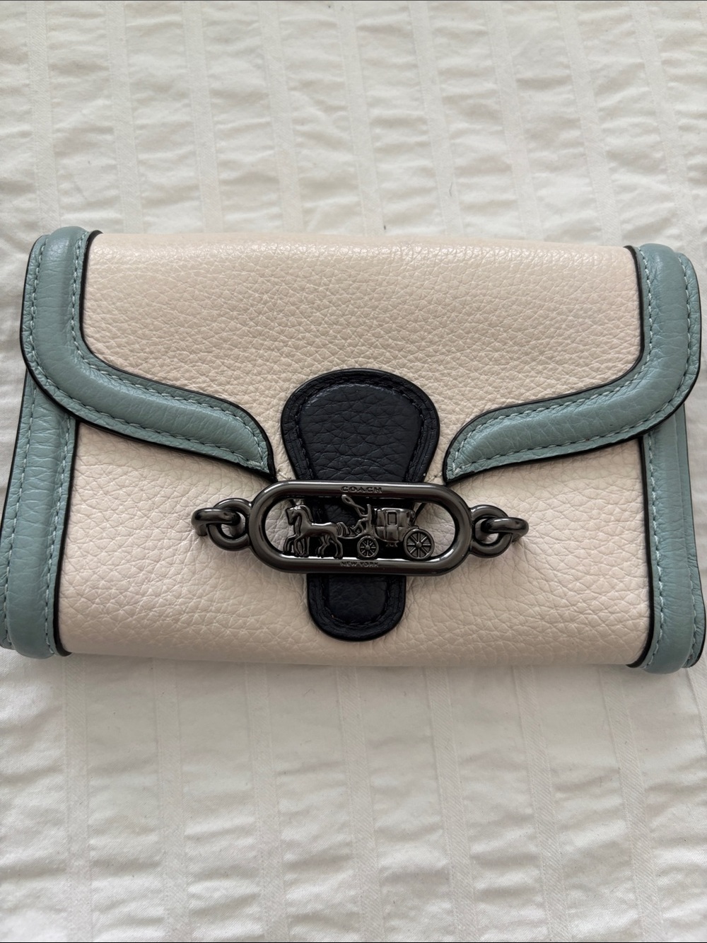 Coach Pebbled Leather Foldover Wallet in Chalk, Blue Trim & Black Accent